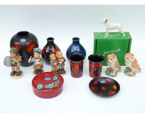 A collection of Beswick figures, Goebel Hummels, Poole pottery etc 