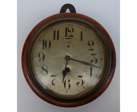 A Junghans ship's bulkhead clock in turned wood case, by repute taken from one of the German fleet at Scapa Flow (the vendor'