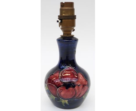 Moorcroft lamp in Anemone pattern on a blue ground, 19cm tall 