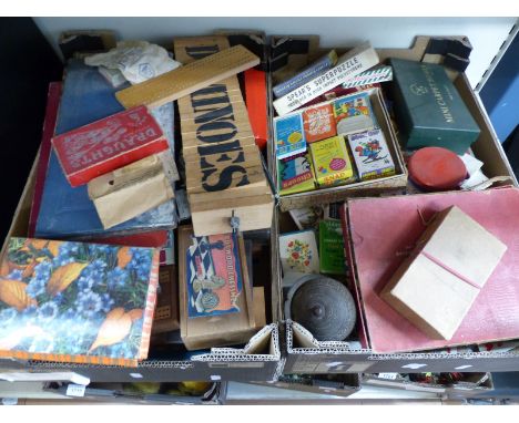 A collection of vintage playing cards and games including a boxwood chess set, dominoes, draughts etc
