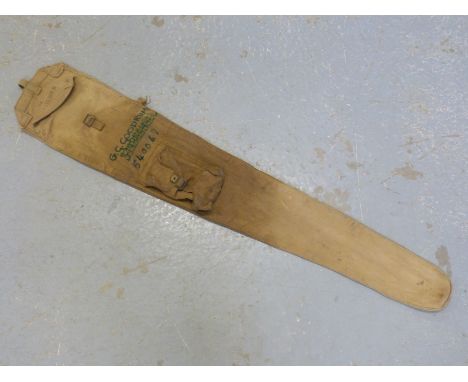 A WWII .303 canvas gun sleeve dated 1942 with ministry broad arrow stamp. 