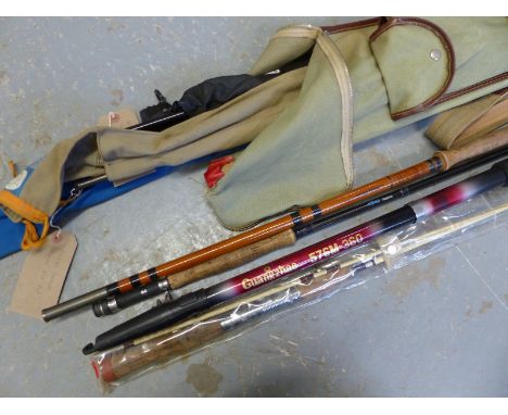 A collection of vintage fishing rods including Ron Thompson spin, Edgar Sealey Black Arrows salmon fly rod, Berkley Phazer 7 