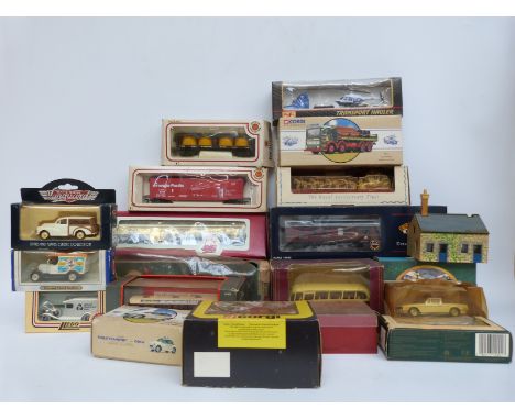 Nineteen Corgi and similar diecast vehicles and Bachmann 00 gauge coaches and rolling stock, all in original boxes 