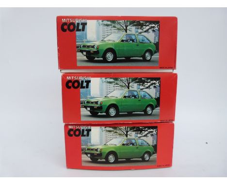 Three Japanese Mitsubishi Colt scale model cars, all in original boxes 