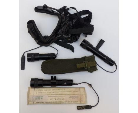 A British Army infrared head sight holder with three range finders together with an emergency fishing kit and rifle cleaning 