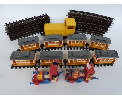 A quantity of Lehmann Gnomy model trams, two Corgi Magic Roundabout locomotives, diesel locomotive etc 