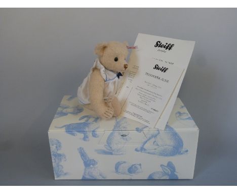 Steiff Teddy Bear June with beige mohair, nautical dress and jointed limbs, limited edition 151/1000, 24cm tall, with box and