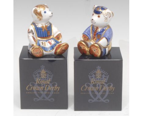 A pair of Royal Crown Derby paperweight Teddy Bears, Schoolgirl and Schoolboy Teddy, 8cm, gold stoppers, printed m arks in re