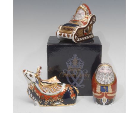 A Royal Crown Derby paperweight, Reindeer, with red nose, gold stopper, 13.5cm long, printed mark in red, boxed; others, Fath