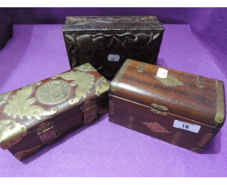 A selection of jewellery and trinket cases including mythological carved dragon and tea caddy