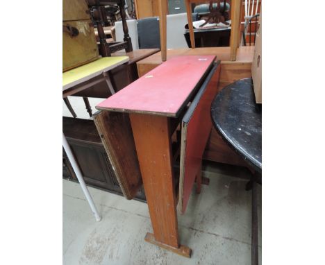 A vintage formica kitchen table and similar chair