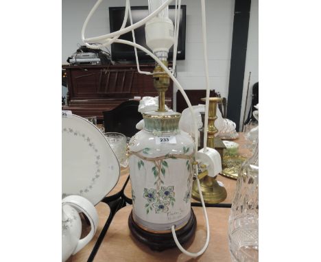 A ceramic table lamp decorated by Gordon Fox