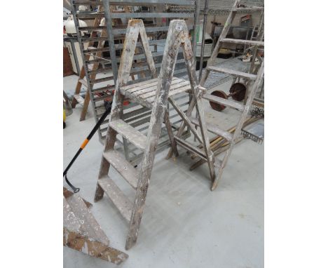 A set of wooden step ladders