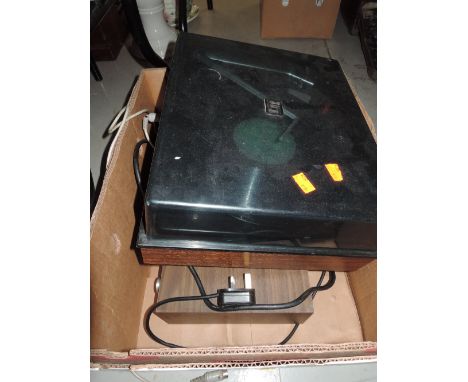 A vintage Garrard 2025TC turntable and a Teleton RG-42 stereo tuner amp