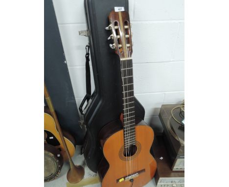 A vintage Kimbara acoustic guitar with hard case