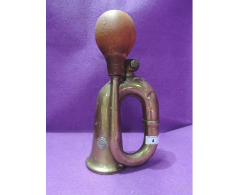 A vintage motor car or engine horn by King Of The Road No. 34