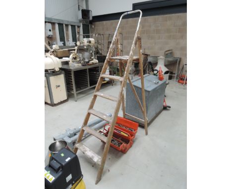 A set of wooden step ladders