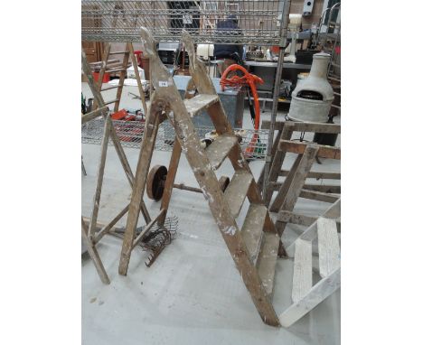 A set of wooden step ladders