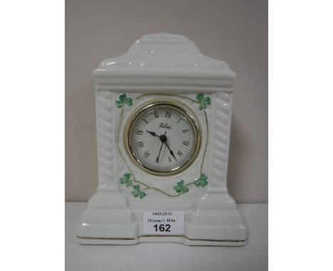 A Belleek china mantel clock