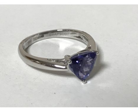 A platinum triangular cut tanzanite ring, size K.