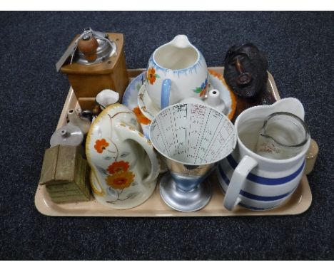 A tray of coffee grinder, Staffordshire milk jug, vintage cooks measure, antique pie funnels etc 