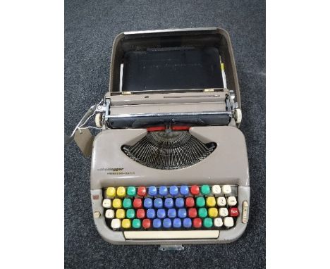A cased Scheidgger Princess Matic vintage typewriter 