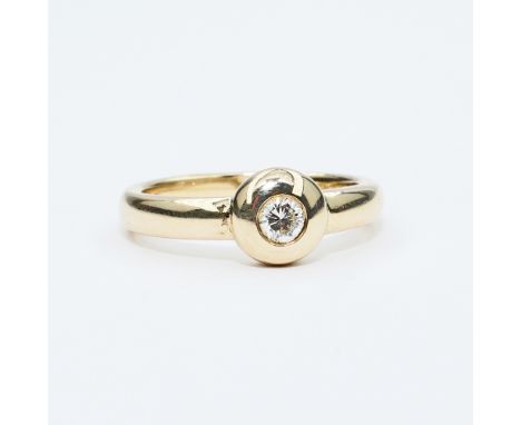 {Brillantsolitär-Ring.} Brillant ca. 0,20 ct. Weiß (wesselton), si. Fassung 14 ct. GG