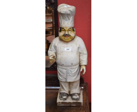 A ceramic baker's shop display figure, 63cm high