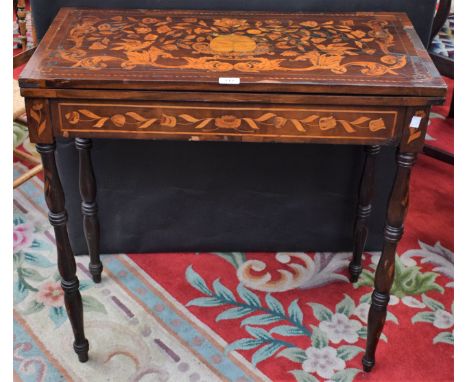 A 19th century mahogany and marquetry card table, folding rectangular top inlaid with scrolling foliage, stems and avians enc