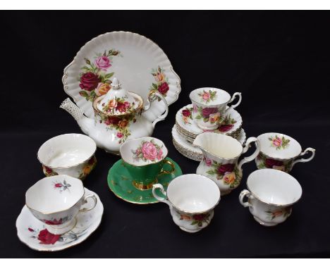 A Royal Albert Old Country Roses pattern teapot; a Royal Albert Kings Ransom pattern part tea set, milk jug, sugar bowl, cups