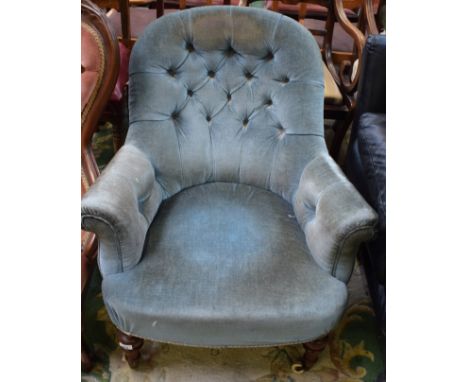A Victorian mahogany nursing chair, button back, blue upholstery, c.1860