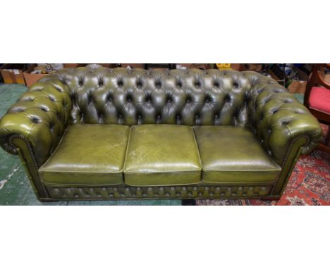 A 20th century leather scroll arm Chesterfield sofa, 190cm wide