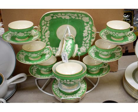 A George Jones Crescent China Rhapsody pattern six setting moulded floral and green part tea set, including cups, saucers, mi