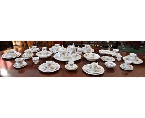 A Royal Albert Moss Rose pattern dinner service, for six, including dinner plates, tea plates, side plates, bowls, two tier c