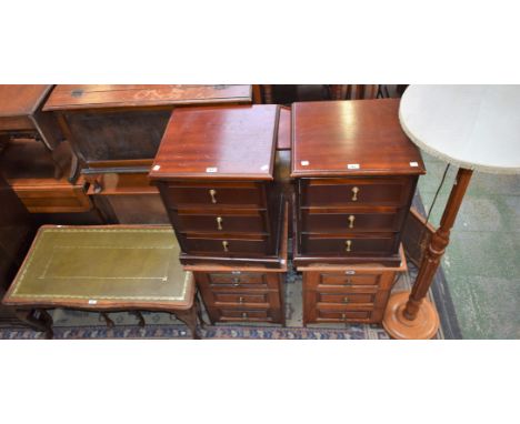 A reproduction coffee table nest, comprising coffee table and a pair of occasional tables; a pair of oak bedside tables; anot