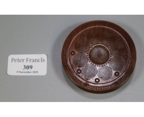 19th century wooden snuff box, of circular form with circular motifs. (B.P. 21% + VAT)