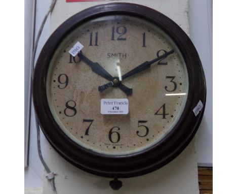 Smiths eight day military Bakelite broad arrow wall clock with military marking and dated 1945 to the reverse.  (B.P. 21% + V