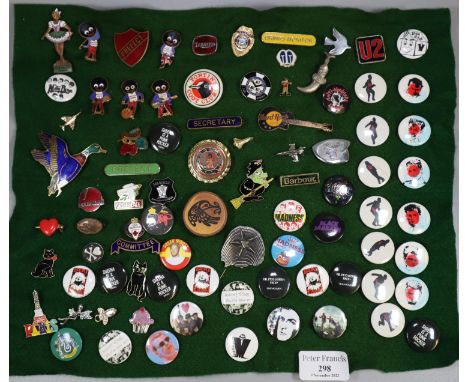 Collection of vintage badges to include 'Robertson's' 'Golly Raspberry Fruit' and other enamel badges, 'Madness', 'Punk', 'Re