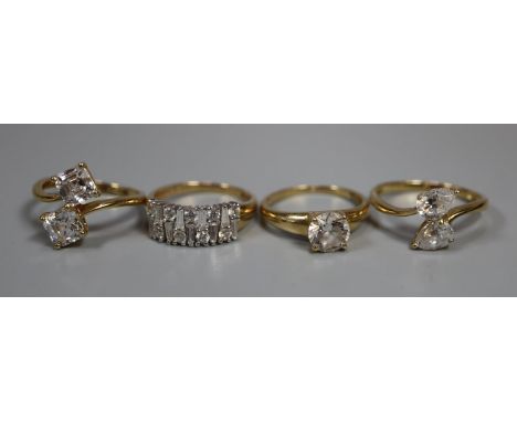 Four 14ct gold stone set dress rings. 10g approx. (B.P. 21% + VAT)The ring sizes are4: two size M1/2, one M and one P.