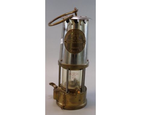 Unused Protector Lamp and Lighting Co. Ltd. type GR6S brass and aluminium Miners safety lamp. 24cm high approx. (B.P. 21% + V