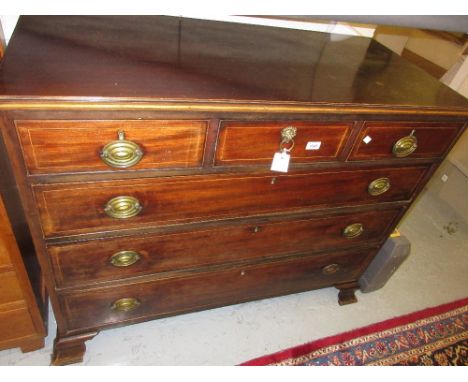 Late George III mahogany and line inlaid straight front chest of three short and three long drawers with oval brass handles, 