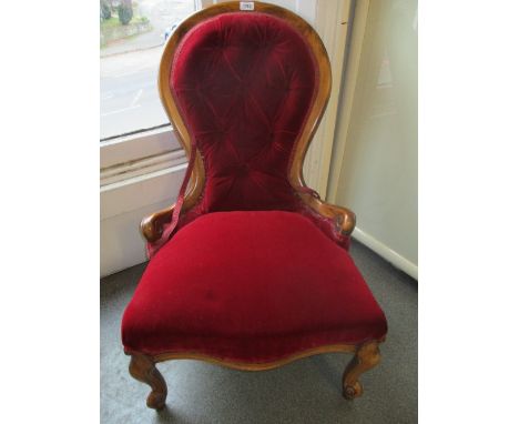 Reproduction Victorian style button upholstered nursing chair on cabriole front supports