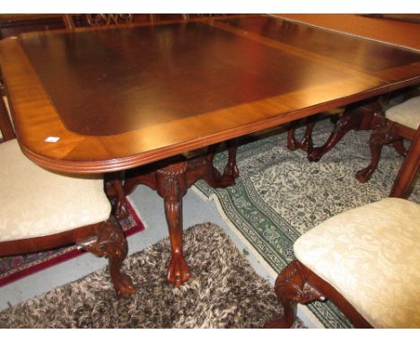 Reproduction mahogany dining room suite comprising:- set of ten (eight plus two) Chippendale style dining chairs with carved 