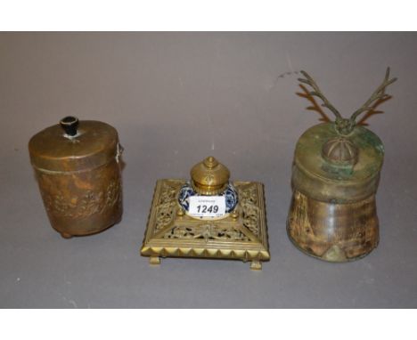 Cast and pierced brass inkwell with blue and white ceramic bowl, another silver plate mounted horse's hoof inkwell (at fault)