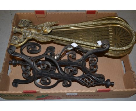 Pair of wrought iron fire dogs together with a reproduction brass fan shaped firescreen and a small quantity of plated flatwa
