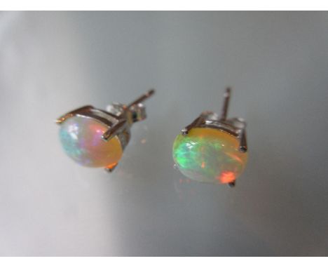 Pair of silver Ethiopian opal stud earrings