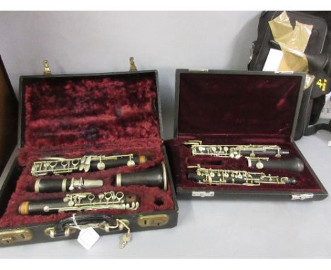 Mile JP181 oboe in case together with a Buisson clarinet in case