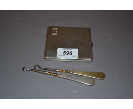 Asprey and Co. Chester silver cigarette case, together with two Asprey and Co. silver handled button hooks