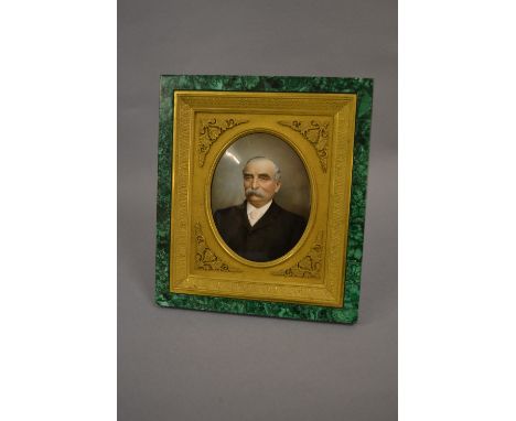 Mathieu Delaroche, 19th Century enamel portrait of a gentleman in a fine ormolu and malachite mounted frame, 9ins x 8ins appr
