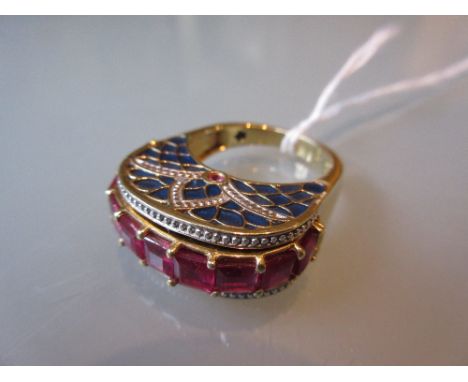 Silver gilt enamel and treated ruby dress ring